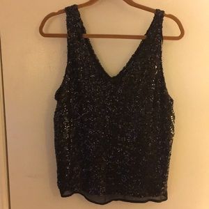 Sleeveless black sequins blouse
